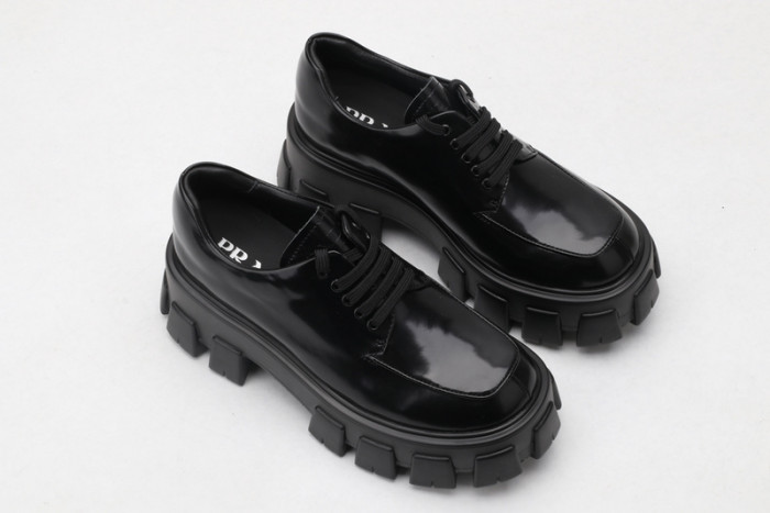 prad brushed leather and nylon lace-up shoes