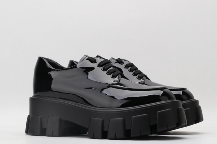 prad patent leather and nylon lace-up shoes