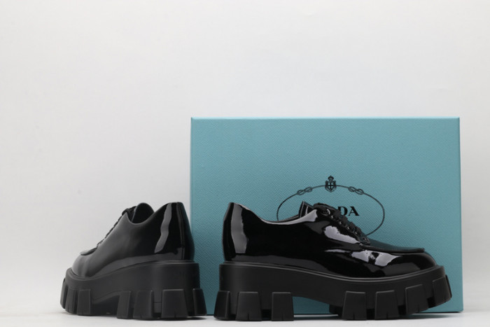 prad patent leather and nylon lace-up shoes